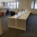 Tan Teknion Hotelling Station with Desk Top Privacy Screens
